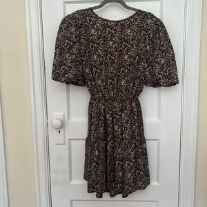Nasty Gal collection. Size 10. Worn once. Floral open back dress. Puff sleeve.